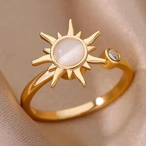 Gold Sun Spinner Ring – Rotating Celestial Design with White Stone & Crystal